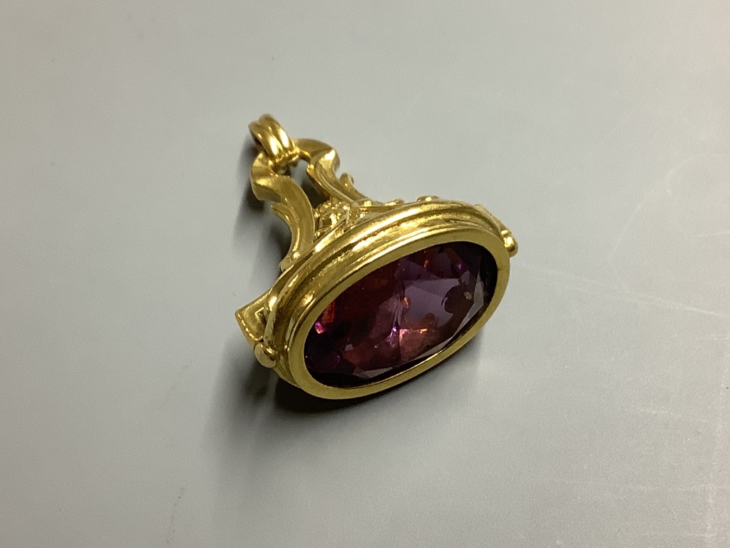 A yellow metal overlaid and amethyst set fob seal